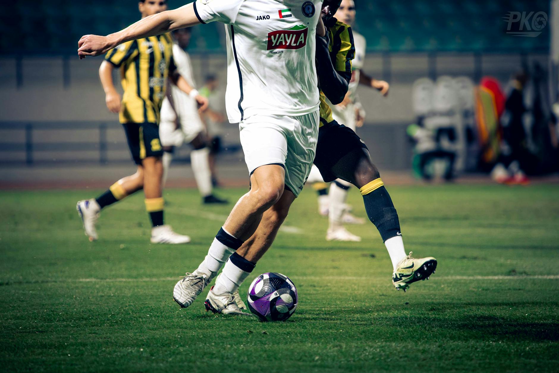 Exciting soccer match showcasing players in action, capturing the intensity and skill on the field.